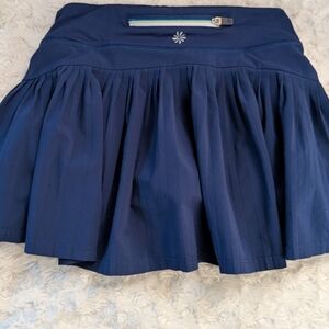 ATHLETA Navy Tennis Skirt with Zipper Pocket